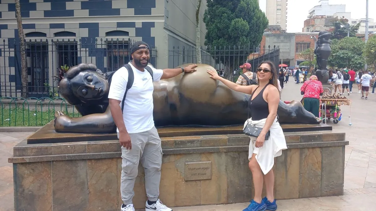 Guests with a Botero sculpture in downtown Medellín