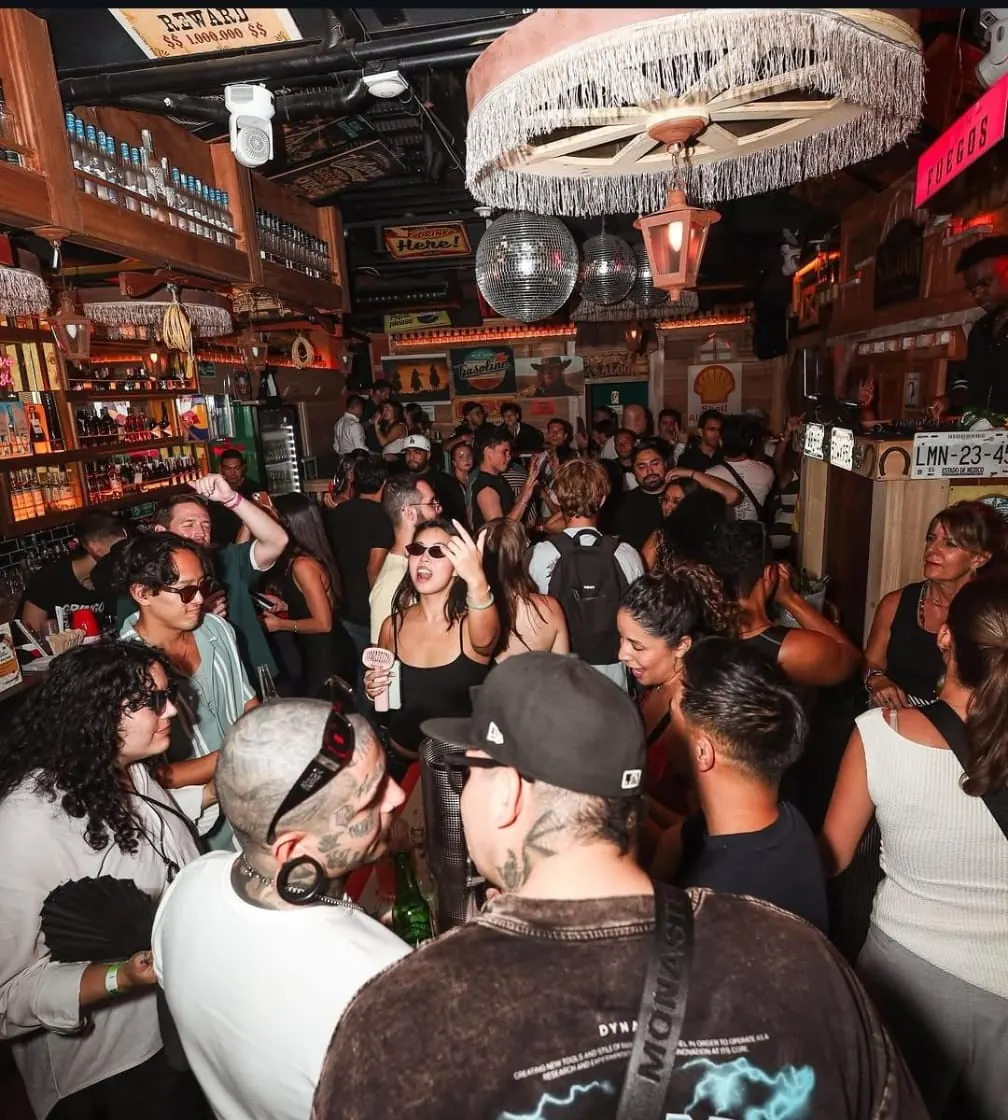 A packed Medellín bar on a tour night